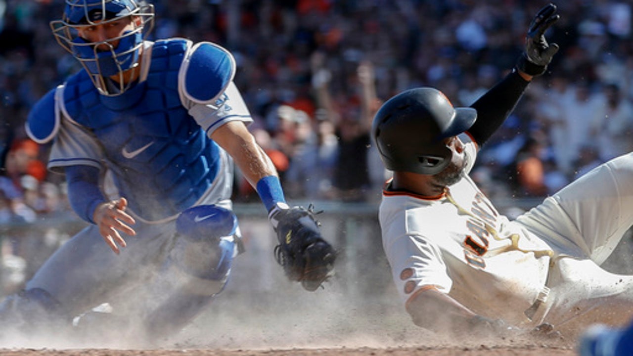 Giants clinch 2nd NL wild card, complete sweep of Dodgers